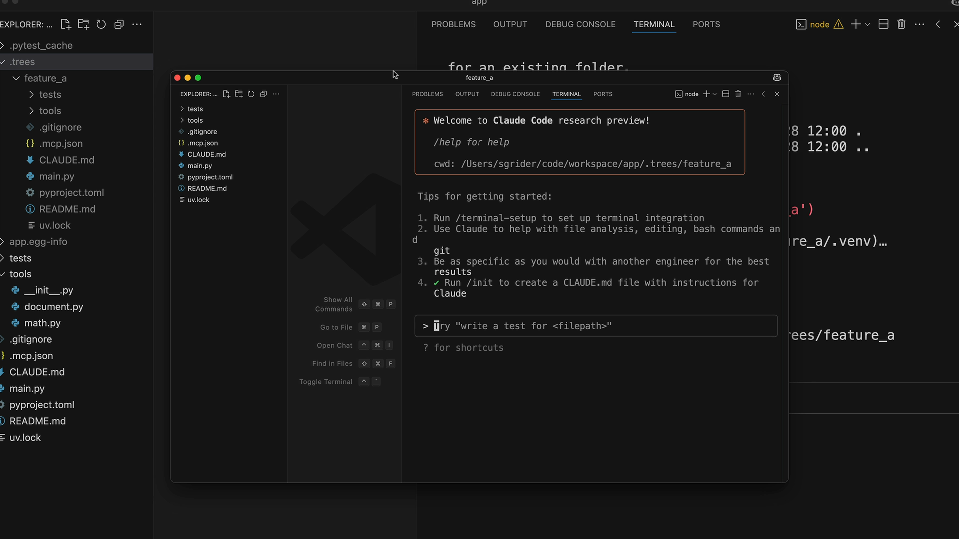 A second VS Code window named feature_a, running Claude Code in the worktree copy of the project files.