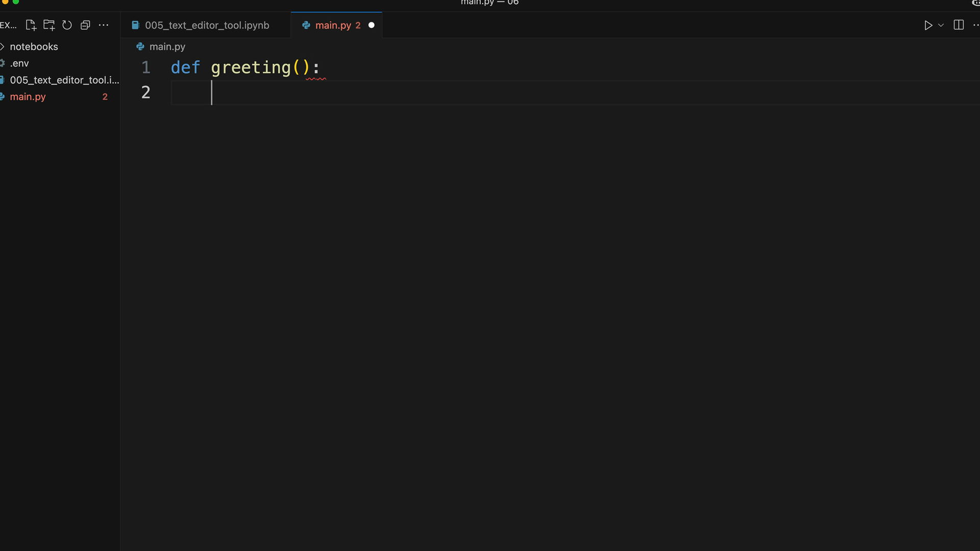 Code editor with main.py open, its only contents the function header "def greeting" and an empty line 2.